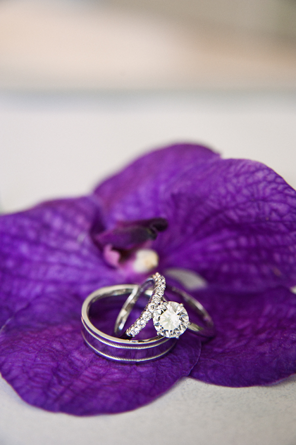 weddings rings detail on purple flower - Honolulu destination wedding photo by top Hawaiian wedding photographer Derek Wong
